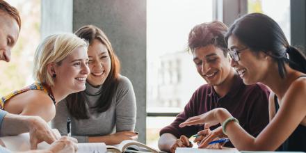 Students studying in college library