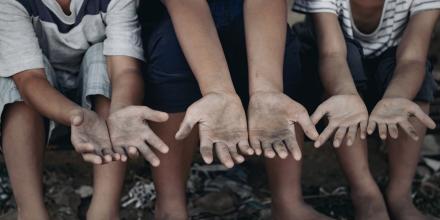 Image of hands of children labor