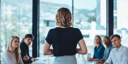 Female business leader conducting a meeting