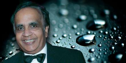 Photo of Saravanamuth Vigneswaran with a background image of water drops