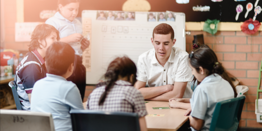 A student teacher in a classrooom
