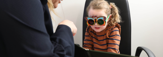 young girl getting eye test