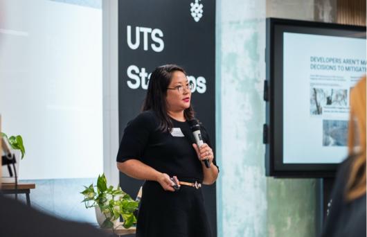 After two weeks of finessing her business pitch, Julie Leung presents her solar building panel technology at the Green Sprint Pitch Night. Image: YeahRad