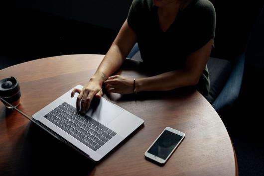 UTS student working on a laptop