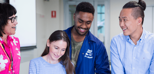 Smiling postgrad students