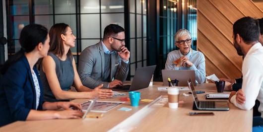 Business people meeting around a table