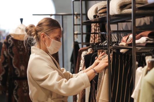 clothes shopping in a mask