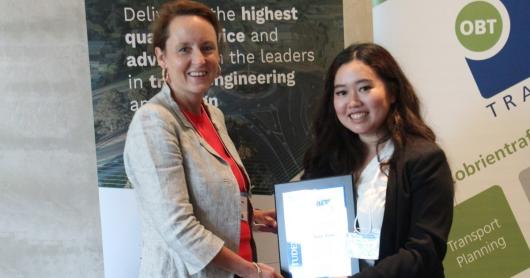 Amy Tran & Kate Kennedy holding certificate at ITE-ANZ Award Presentation 2023