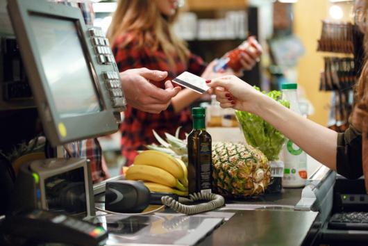 Supermarket checkout. Adobe Stock