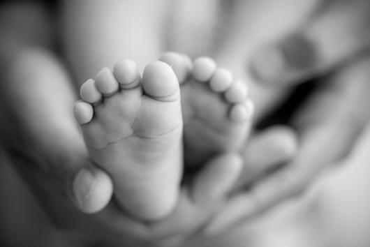 Black and white picture of baby feet