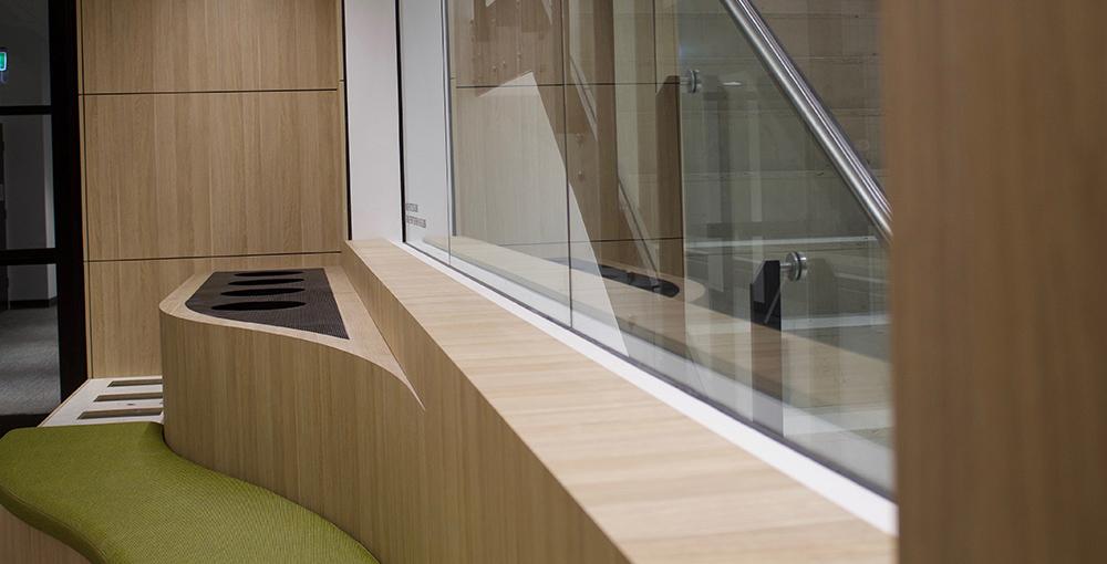 Graduate School of Health clinic’s waiting area that looks onto the central staircase. 