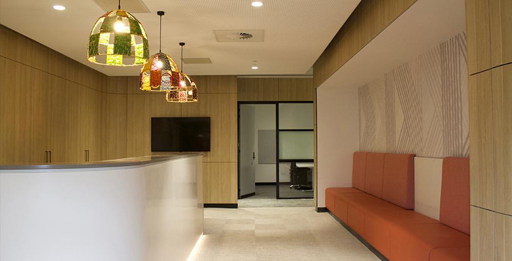 The School’s reception area – like many of the interiors, the space has many beautiful woven textures.