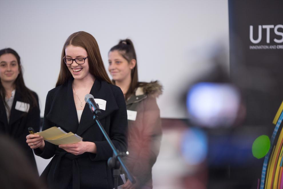 Girls speaking at showcase