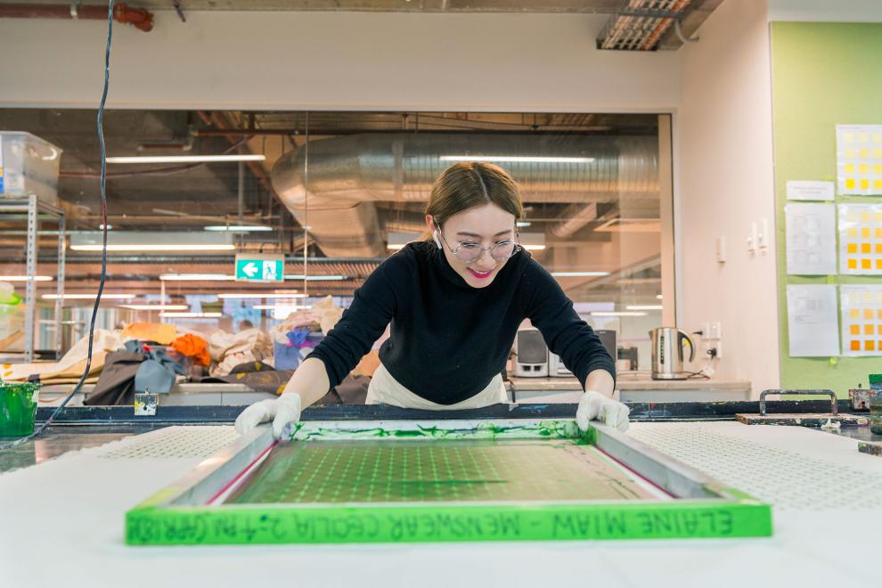 Student uses textile printer at DAB studio