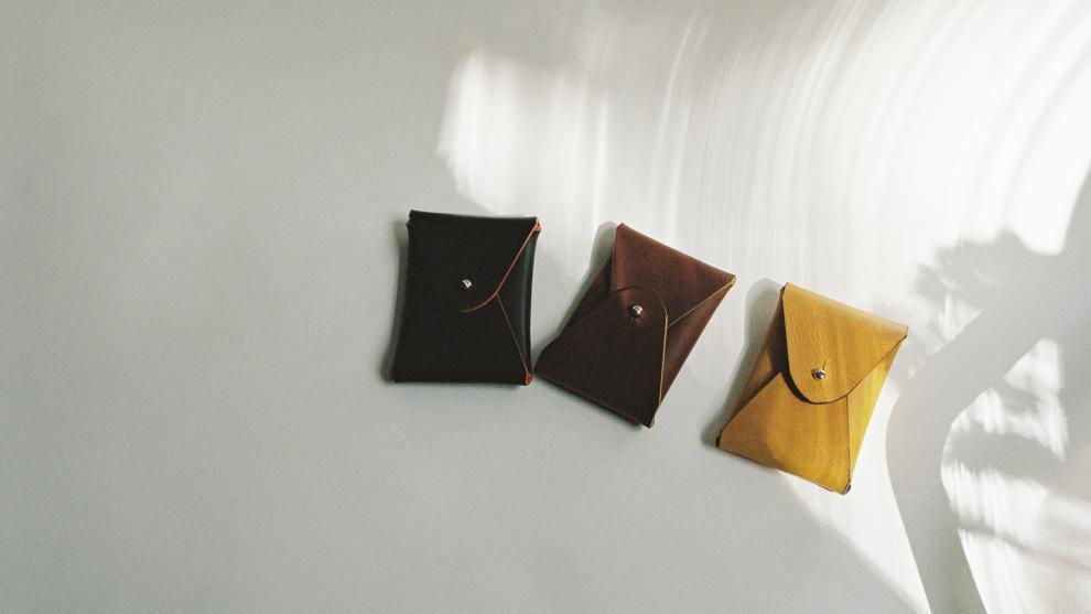 Three small leather purses.