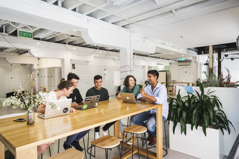 startup community working in the basement