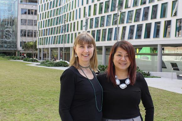 two female academics at alumni green