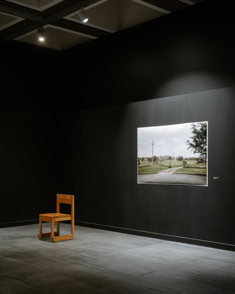 Installation of photographs and furniture