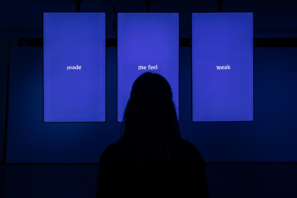 Installation view of UTS Gallery bathed in blue light