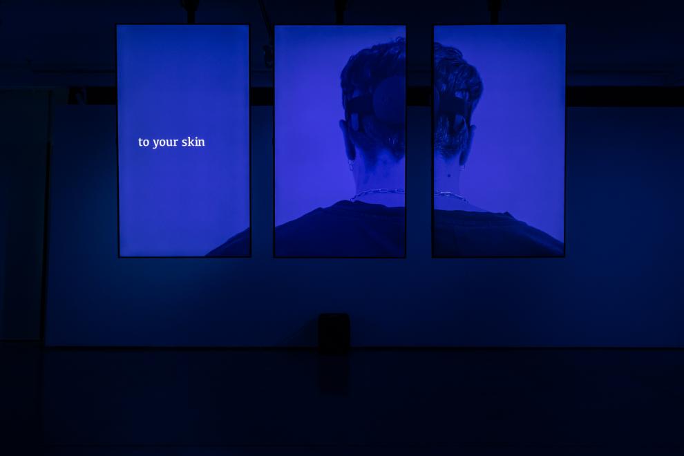 Installation view of UTS Gallery bathed in blue light