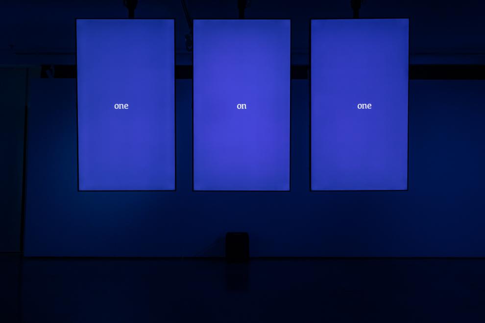 Installation view of UTS Gallery bathed in blue light