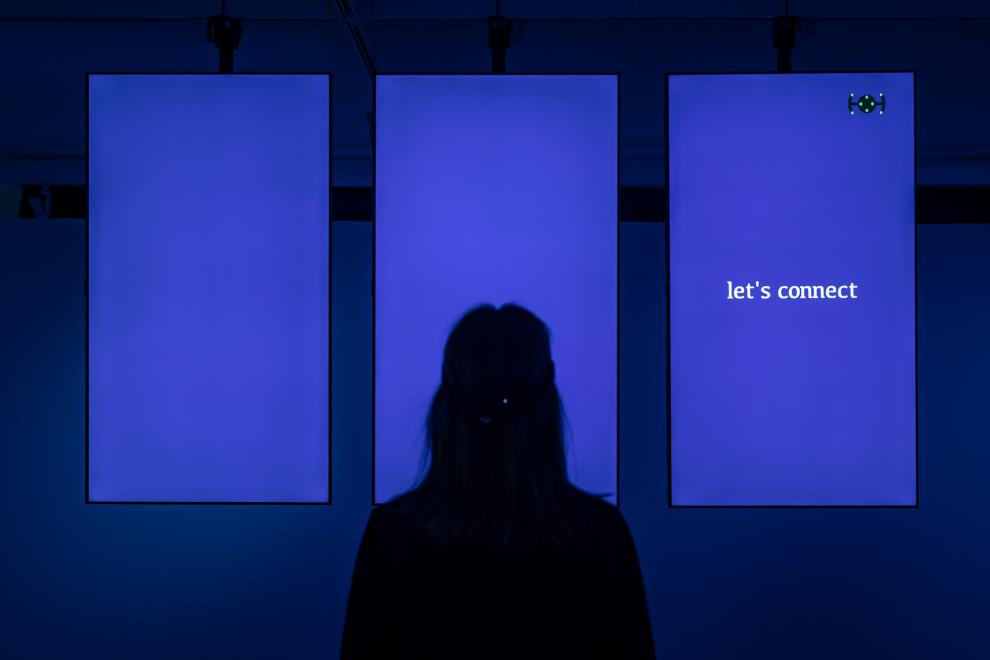 Installation view of UTS Gallery bathed in blue light