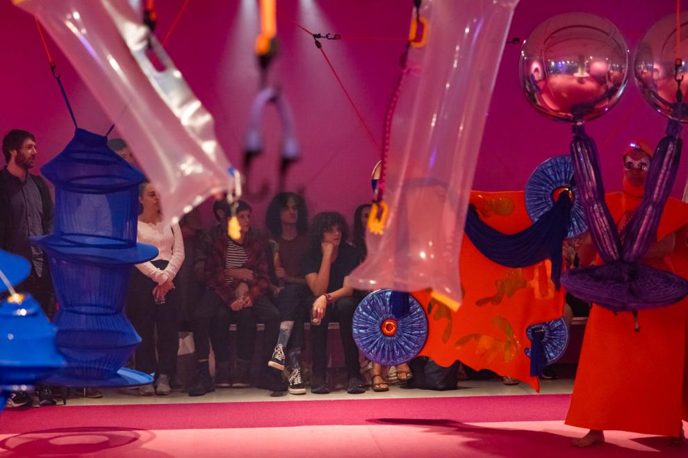 A colourful installation of costumes