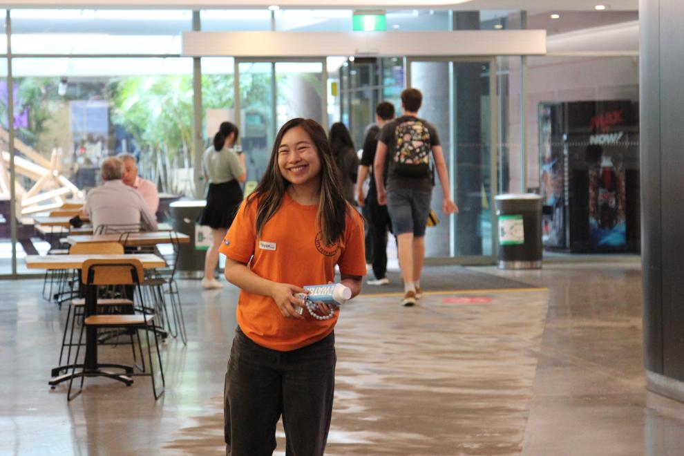 A Peer Networker smiling in a cafe