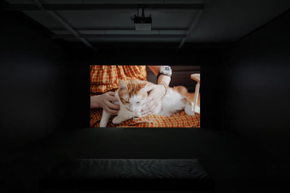 A projections screen in a dark space