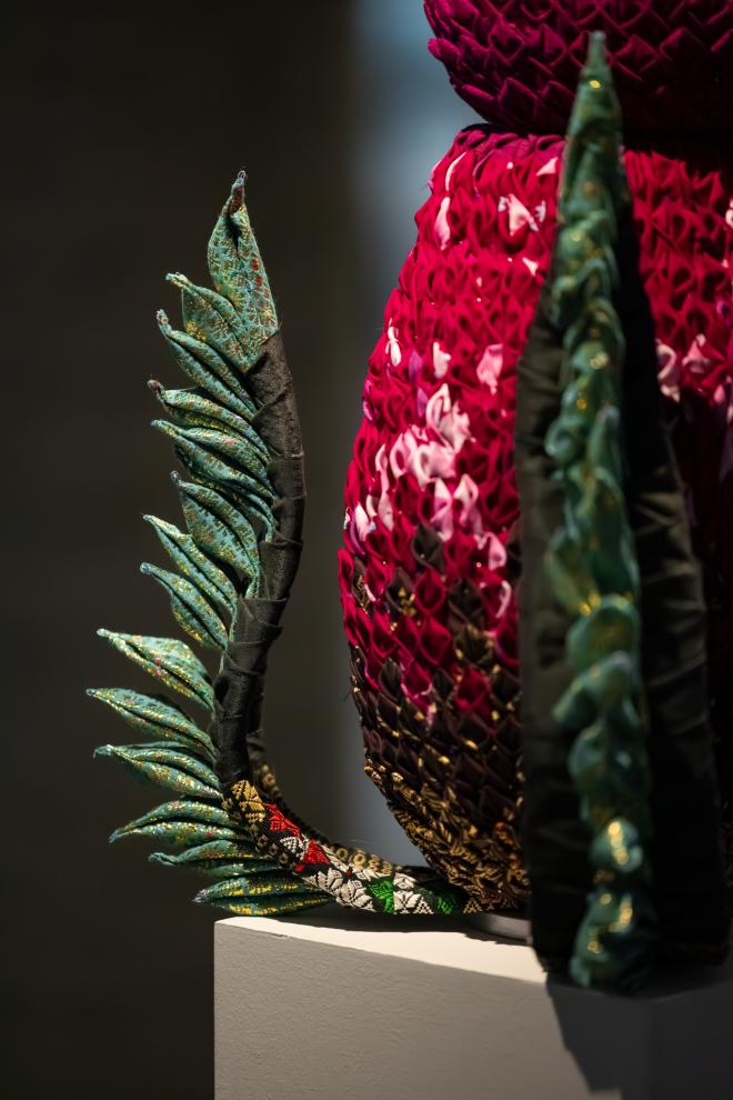 A close up image of a sculptural object made of textiles