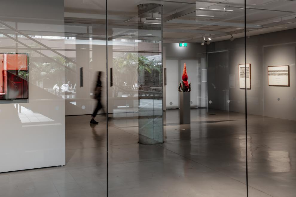 A wide angle photo of a gallery from outside 