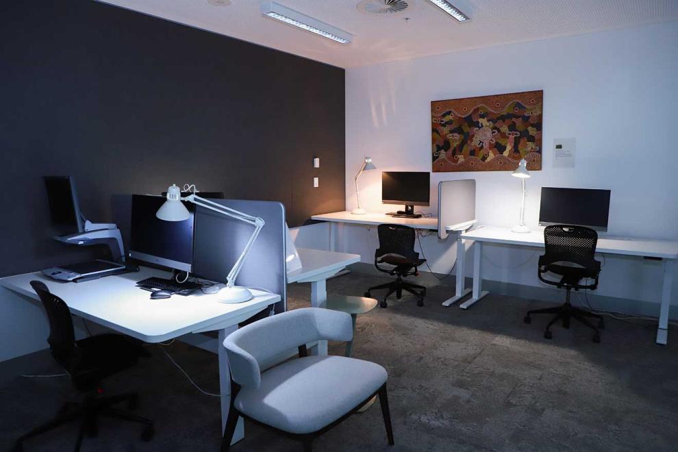 Large room with several computers on desks