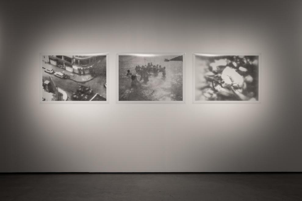 A photograph showing a grouping of three black and white photographs