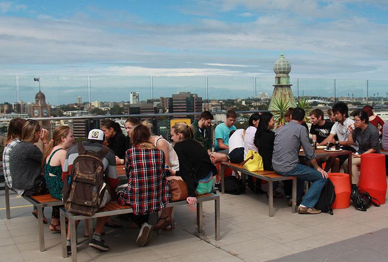 Group of people sitting outdoors