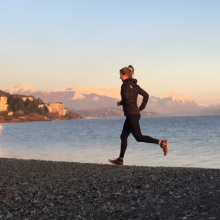 Alana Leabeater, UTS Sport and Exercise Science student, runs on beach