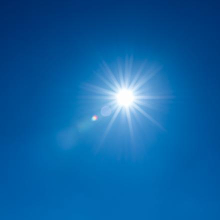 The sun in a blue sky