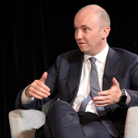 Matt Kean sits in a chair wearing a suit. He is talking.