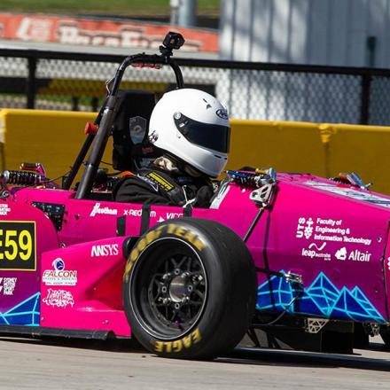 The UTS Motorsports vehicle in a time trial race