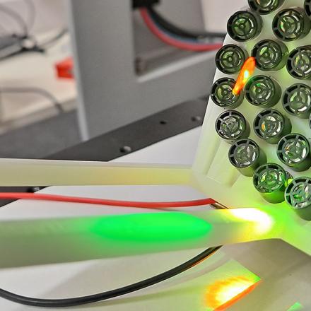 An array of ultrasound speakers levitating Bee's wing and leg