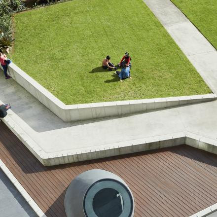 Aerial shot of UTS students sitting around Alumni Green