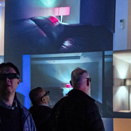 People watching the multiscreens in the UTS Data Arena