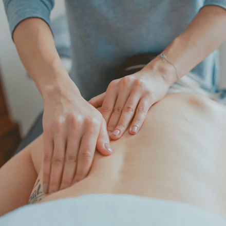 Someone giving another person a massage.