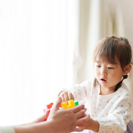 Child playing with toys