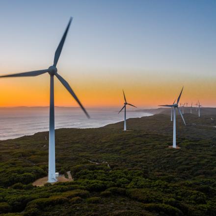 Wind turbines at sunset