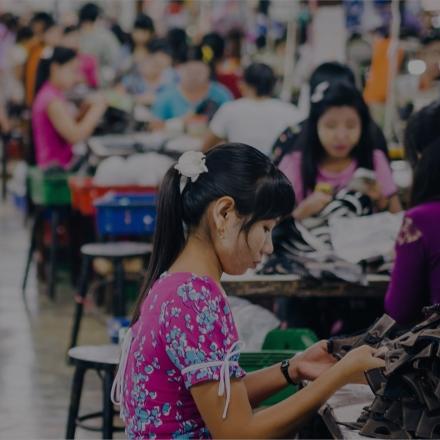 Image of women sewing in a textile factory