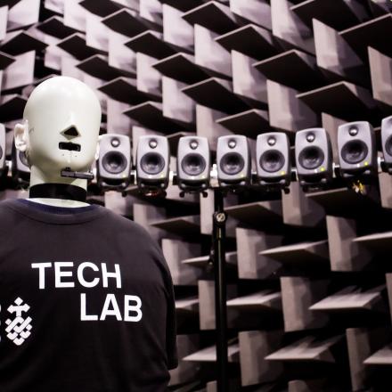 Photo of the Hemi-anechoic chamber with audio and acoustic equipment 