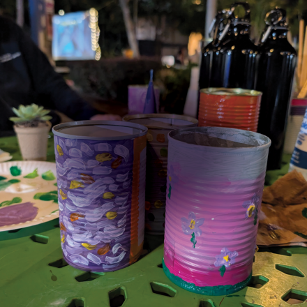 Tin cans decoratively painted