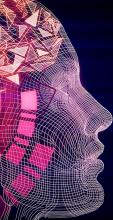 Geometric human head in tones of pink through orange on a dark background