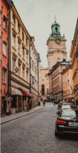 Streets of Stockholm with Storkyran, Cathedral of St Nicholas in the background.