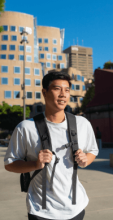 UTS International student with backpack and UTS Business Building 8 in the background